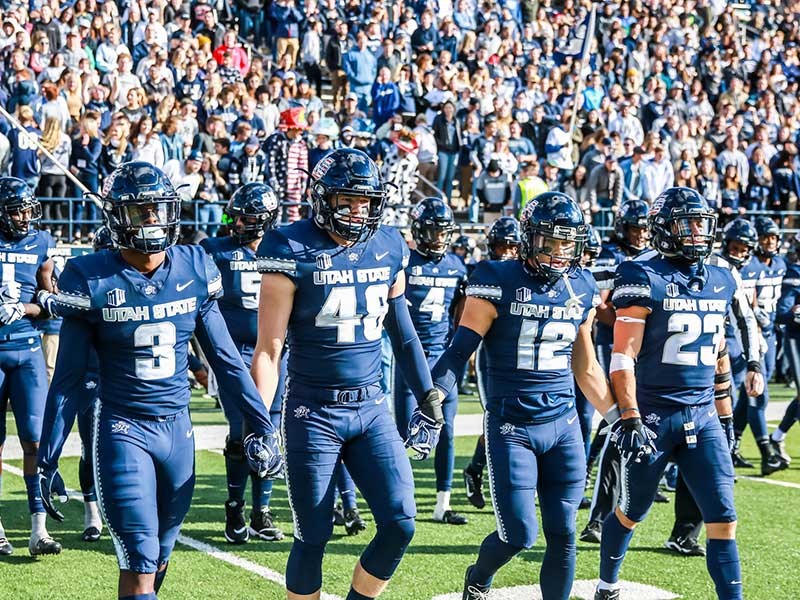lineup of USU football players