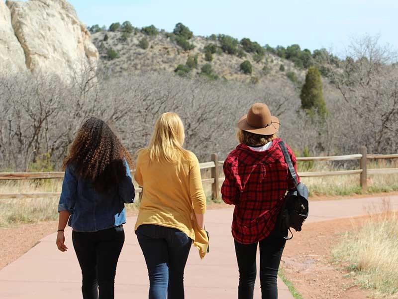 three friends walking