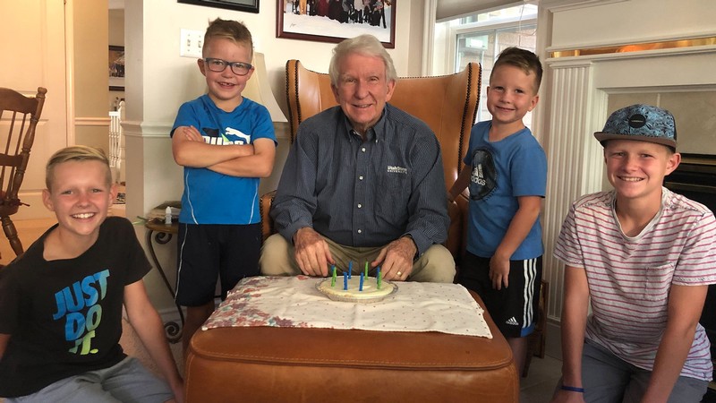Grandfather with his granchildren.