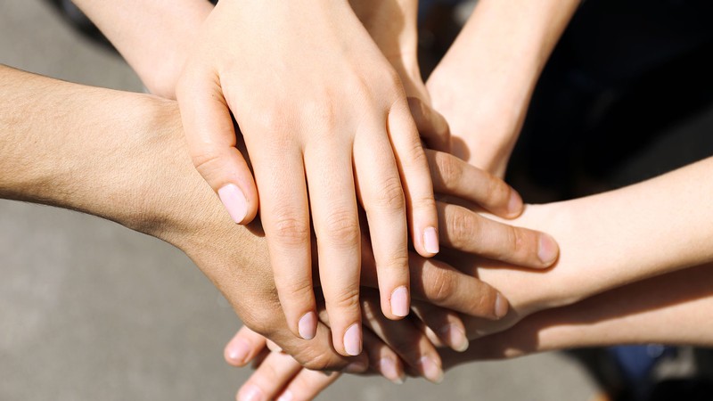 group of hands united together.