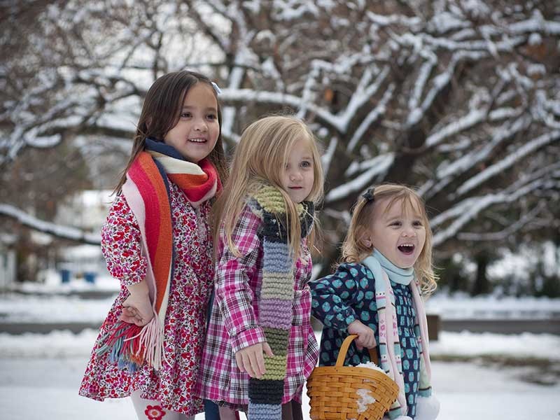 three sisters in holiday clothing