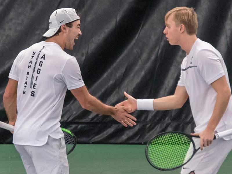 men's tennis players on the court