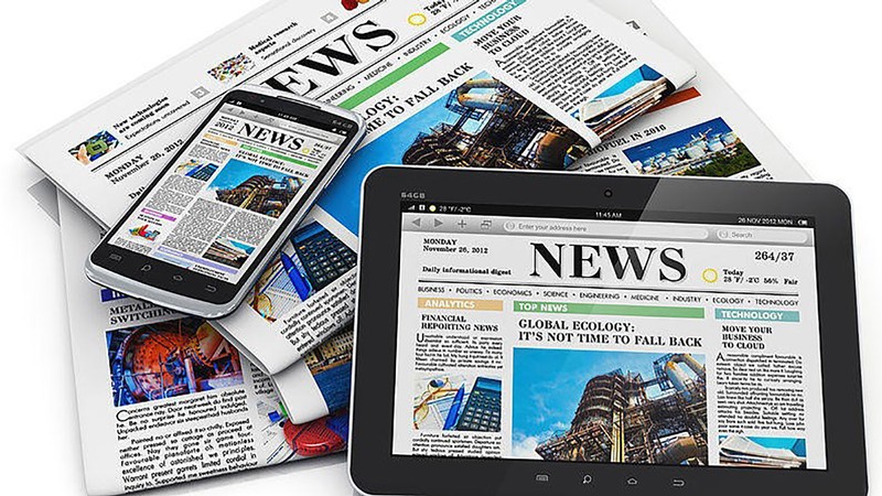 newspapers on a table.