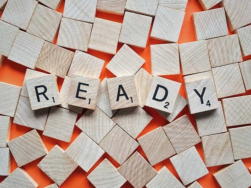 scrabble letters spelling out the word 