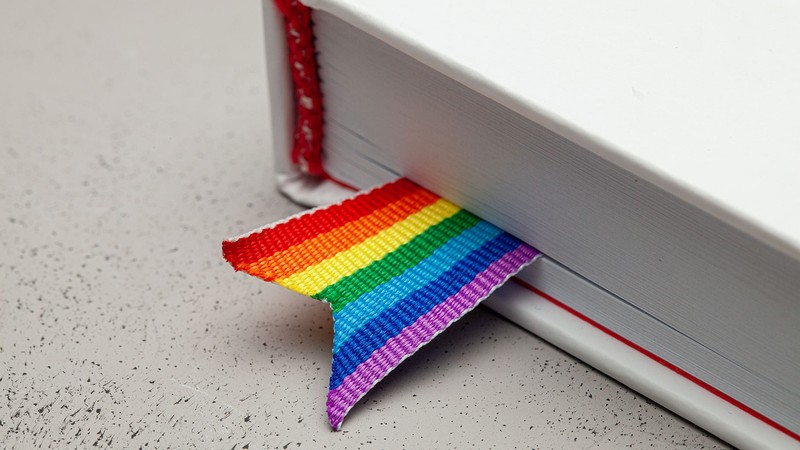 book with rainbow flag bookmark.