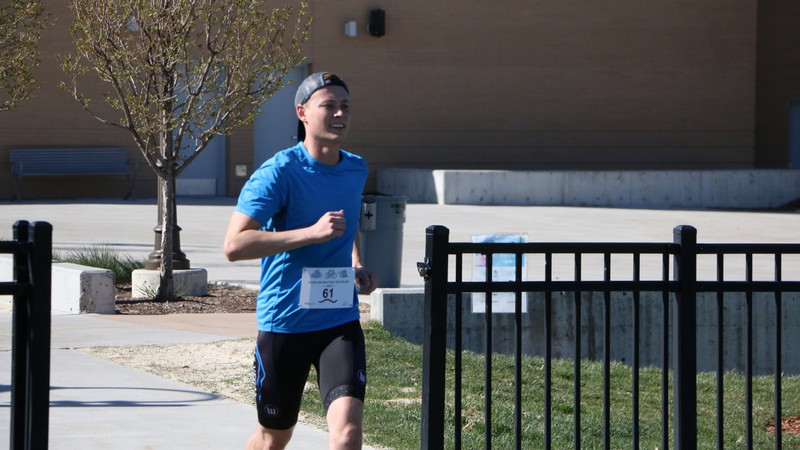 USU student running in a marathon.