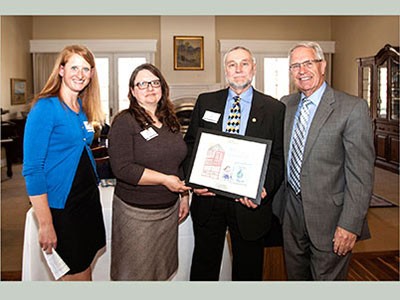 Campus Compact honoree Larry Smith and guests at Campus Compact award ceremony