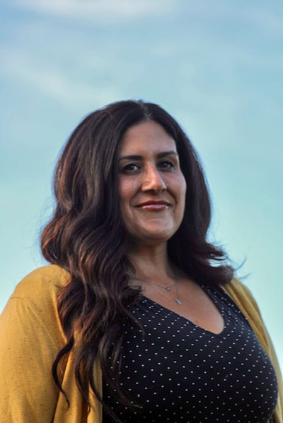 Kate Kamachi poses for a photograph.