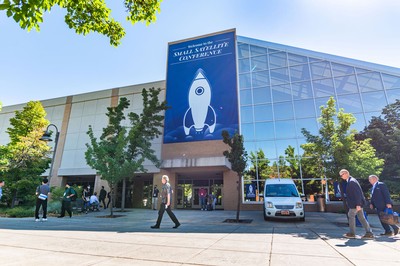SmallSat attendees walk past the Taggart Student Center.