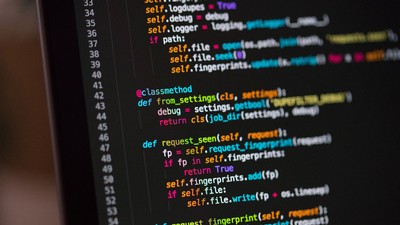 A computer screen displaying programming code.