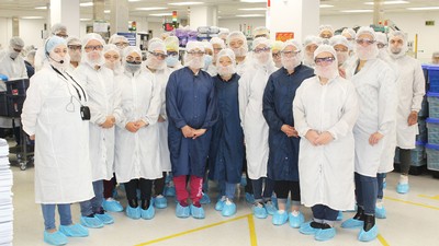 Employees in personal protective equipment.