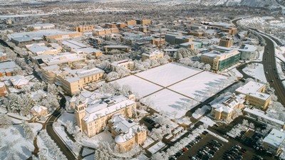 An aerial view of the USU Logan Campus in winter.