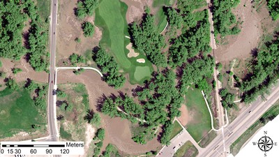 An aerial photograph of flooding on the Logan River Golf Course.