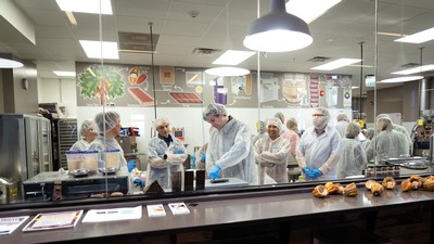 Professionals participating in a course at the Aggie Chocolate Factory.
