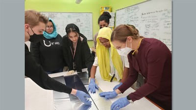 People working on a STEM project.
