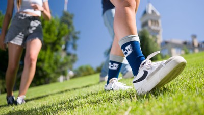 People walking on Old Main Hill in Logan.