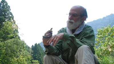 USU herpetologist Al Savitzky with keelback snake
