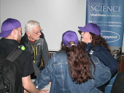 Professor David Peak meets with students