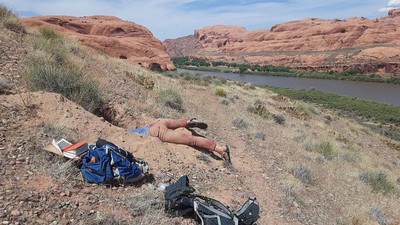 USU geoscientist collects rock sample