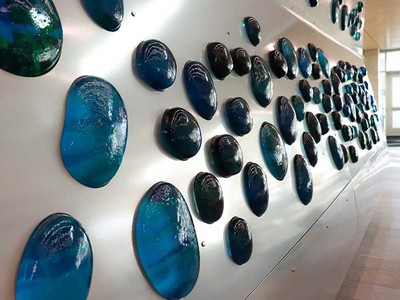 “Surface Tension” glass sculpture]