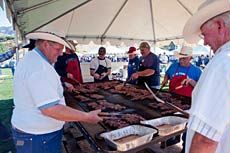 grills and cooking at the Utah Agricultural Products Barbeque