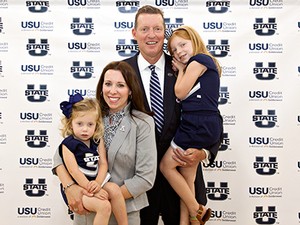 John Hartwell, USU athletics director and his family
