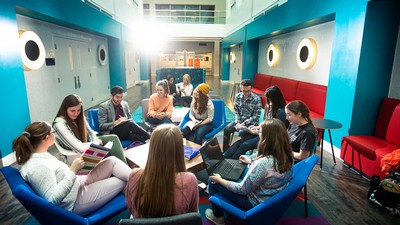 Students gathered in the College of Education and Human Services Building atrium.