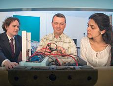USU professor Ryan Gerdes, Daniel Dunn and Soodeh Dadras prepare vehicle test
