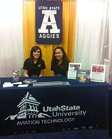 USU student pilots at conference table