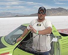 USU sttudent Mike Morgan and a truck fueled by USU produced biofuel