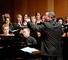 Director Cory Evans with the USU Chamber Singers