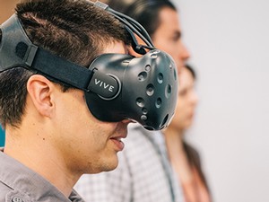 person wearing virtual reality glasses