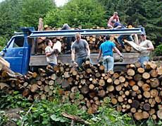 Cadets loading firewood in truck