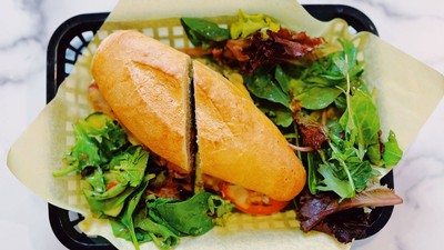 A sandwich and salad.