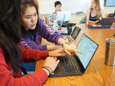 Students collaborate on research related to wildfire patterns