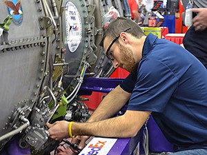 USU aviation maintenance team member Stephen Colton working on a competition task