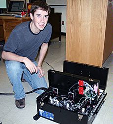 USU student Justin Koeln with experiment