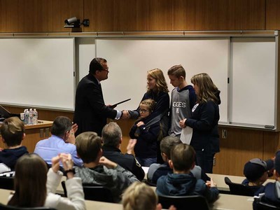 CAAS Dean Ken White presenting Andy Barnes’ diploma