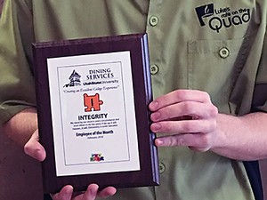 USU Dining Services plaque with the core value