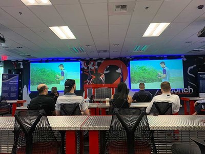 people gathered in an air control room.