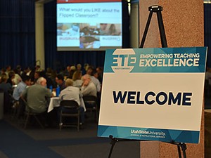 An Empowering Teaching Excellence conference sign at a session