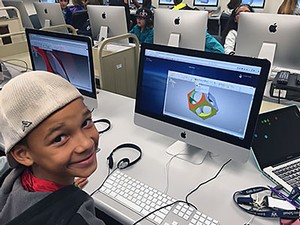 a boy at USU's Young Education Technology Center