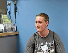 student being photographed for ID card