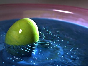 an egg spinning in milk