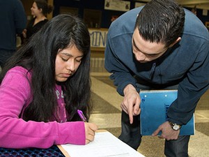 A USU student member of SHPE at the openhouse