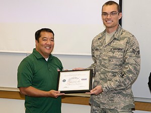 USU's Chad Mano receiving his Patriot Award