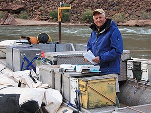 USU professor Jack Schmidt aboard a boat on the Colorado River