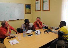 Extension specialist Steve Daniels in a meeting with international colleagues
