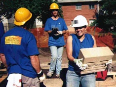 Several Extension landscape workers on site