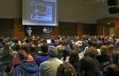 Parents and students gather for a Scholars Day presentation